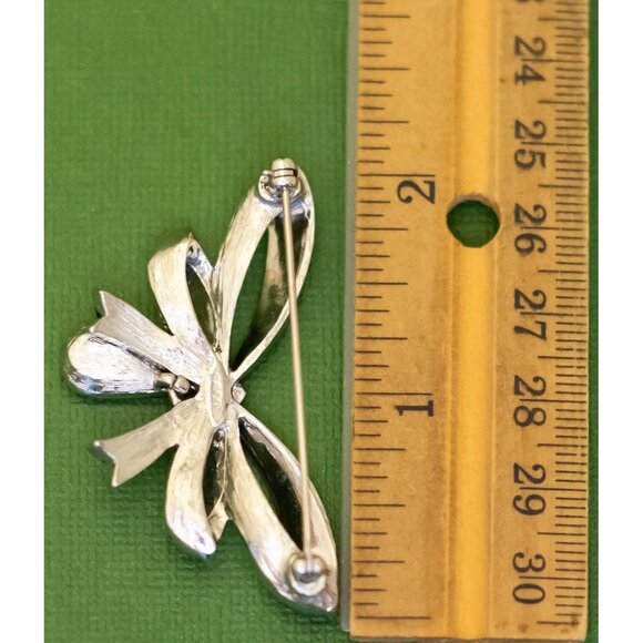 Vintage Intricate Butterfly Ribbon Silver Tone Brooch by Avon K40 - Picture 2 of 2
